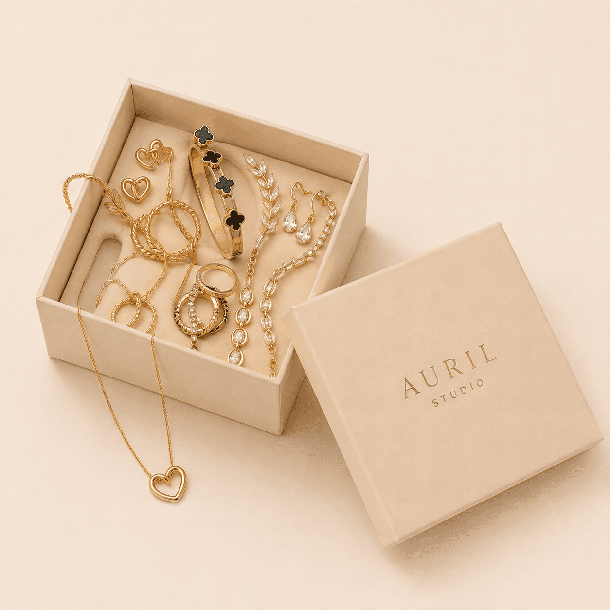 Open Auril Studio jewellery boxes with gold pieces