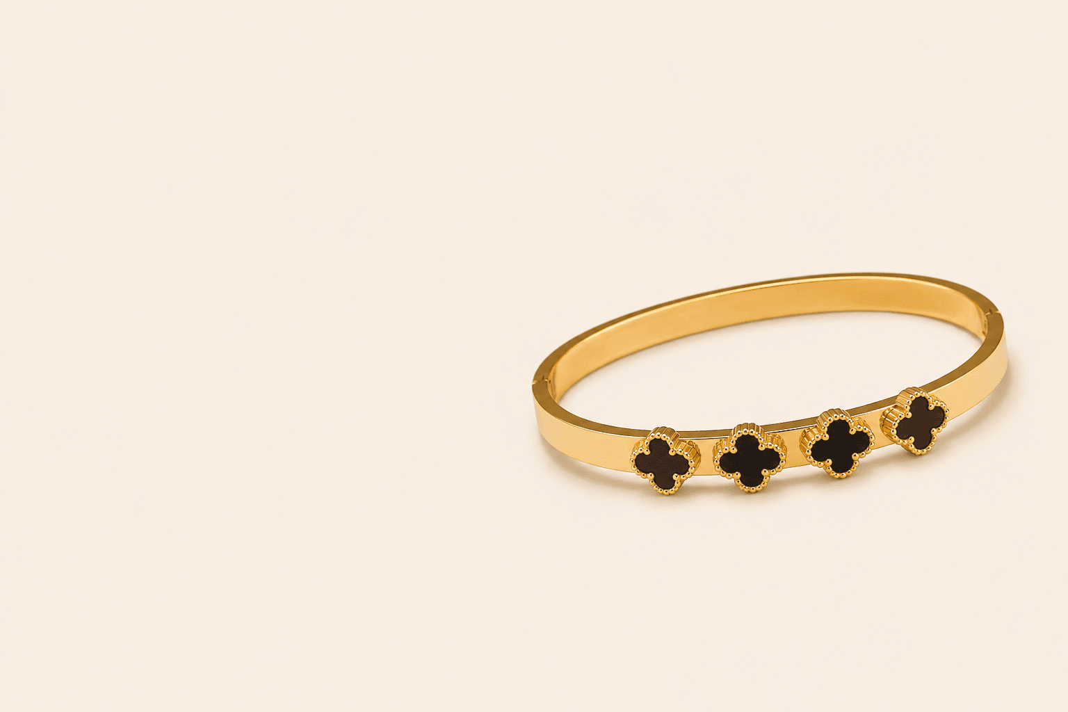 Gold quatrefoil bangle bracelet