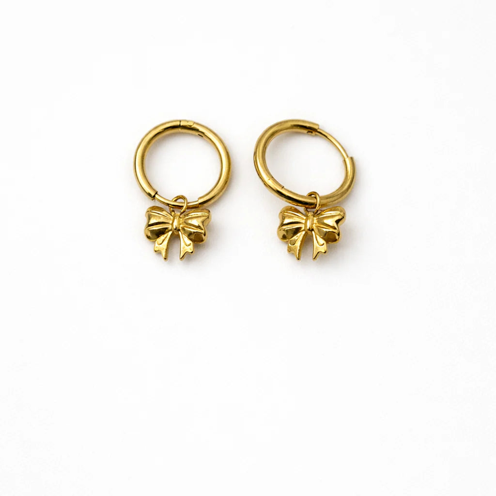 Anti tarnish gold huggie hoop earrings with sculpted bow charm