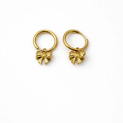 Anti tarnish gold huggie hoop earrings with sculpted bow charm