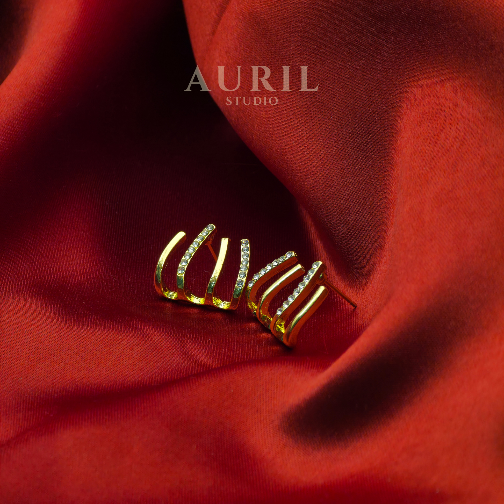 Crystal Claw Four-Prong Gold Stud Earrings